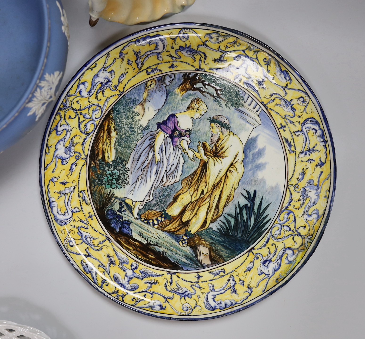 A Gien faience dish, Wedgwood jasper fruit bowl, an Art Deco Katzhutte figure and a pair of basketweave dishes, tallest 23cm
